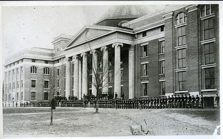 Cadets parade in front of Academic Hall in 1885.