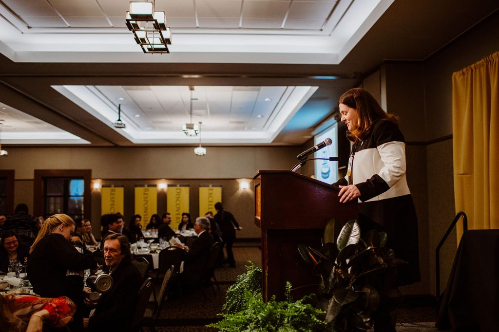 Dean Kathryn Chval presents an award at the 50th Annual Awards Banquet, University of Missouri College of Education
