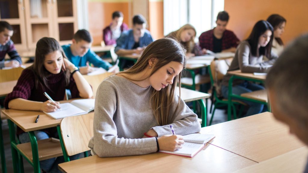 students studying in a classroom