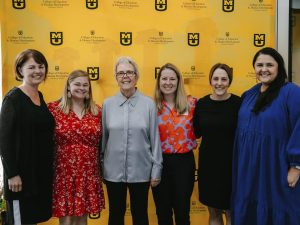 Peg McLaughlin and college faculty members
