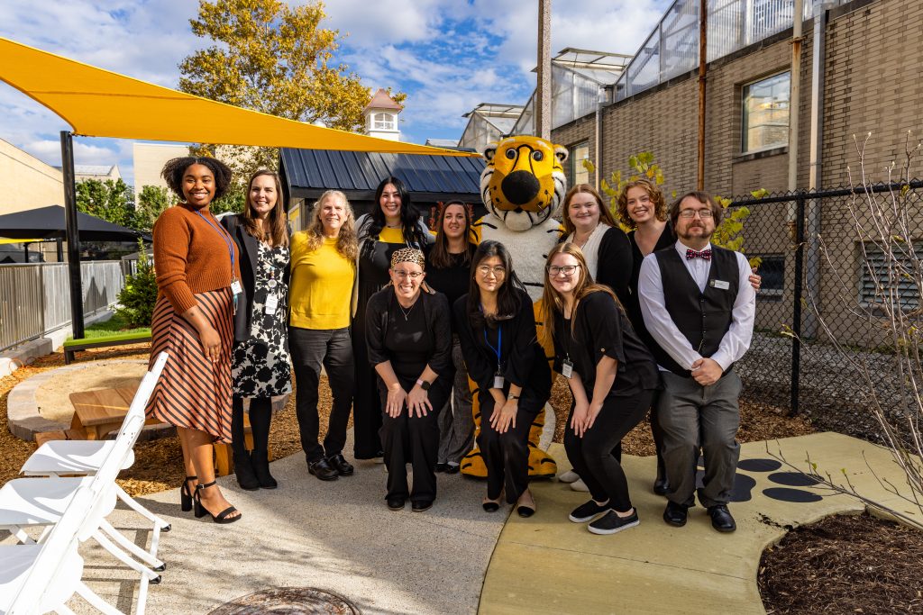 A group photo with Truman the Tiger.