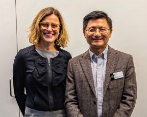 Two deans standing next to each other