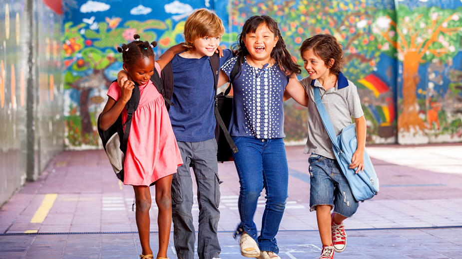 four children walking together