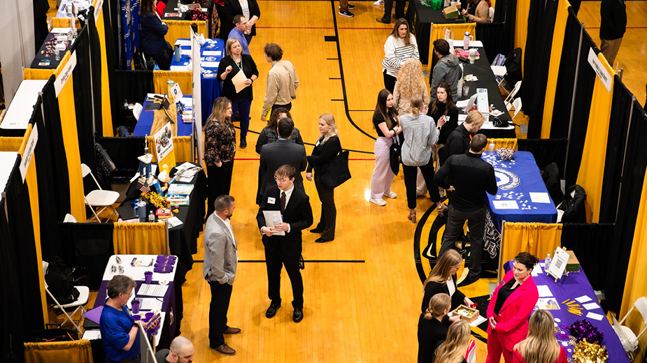 Students walking through a career fair