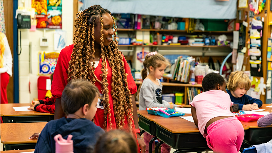 Student teacher in classroom with students