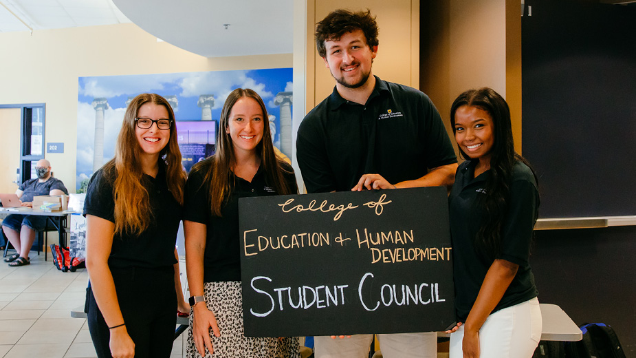 Three student council members at involvement fair
