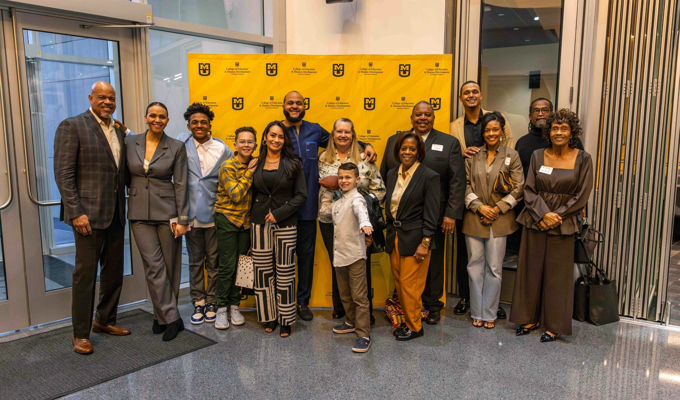 a group of people posing for the camera