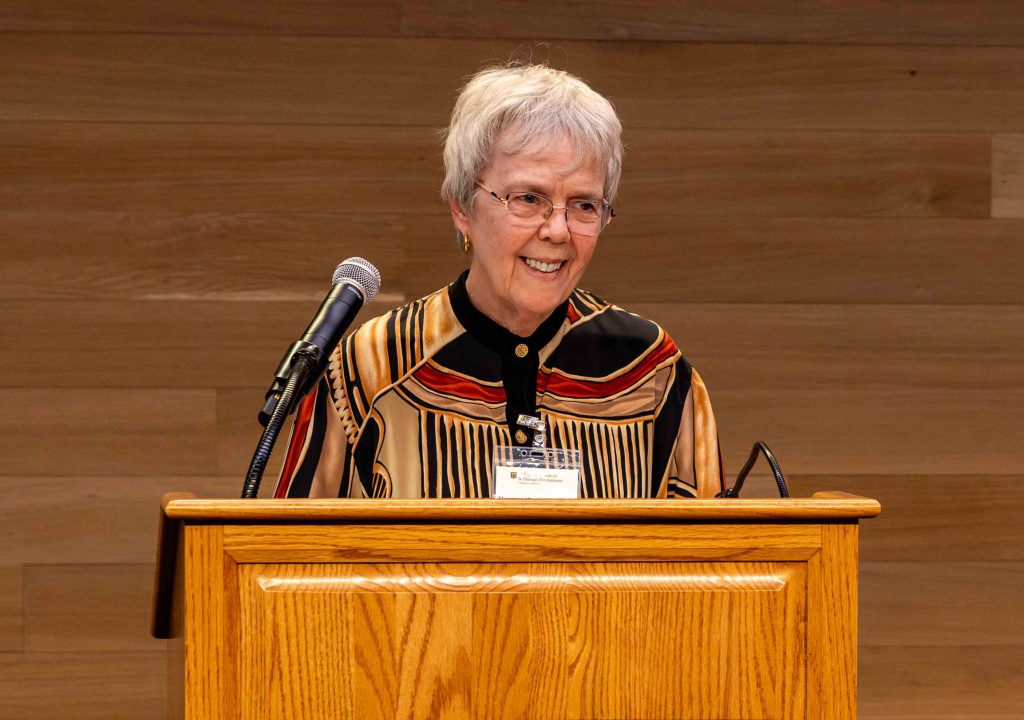 Peg McLaughlin at the podium