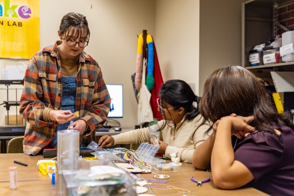a group of people crafting together