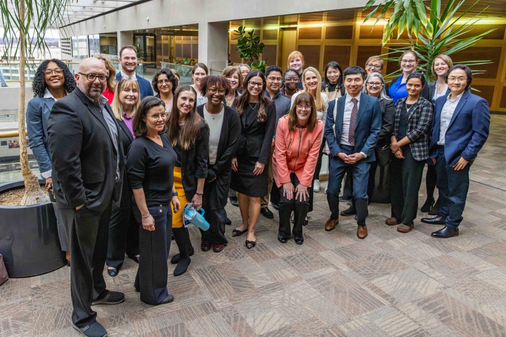 a group of people smiling for the camera