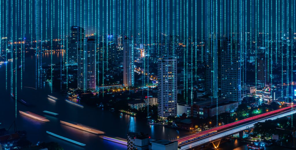 Blockchain title with 0 and 1 data flying over on night city