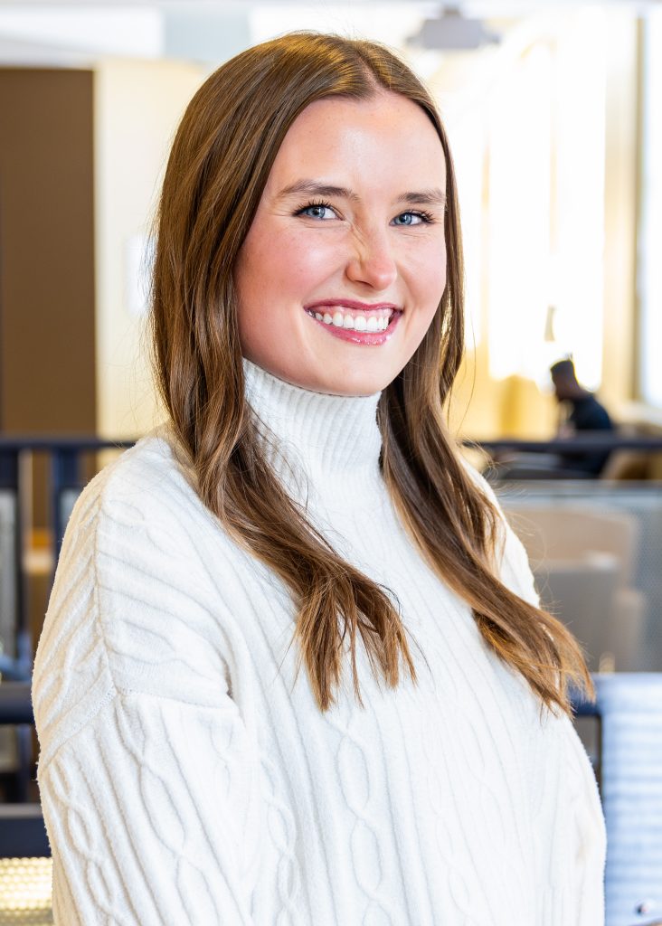 a person smiling for the camera