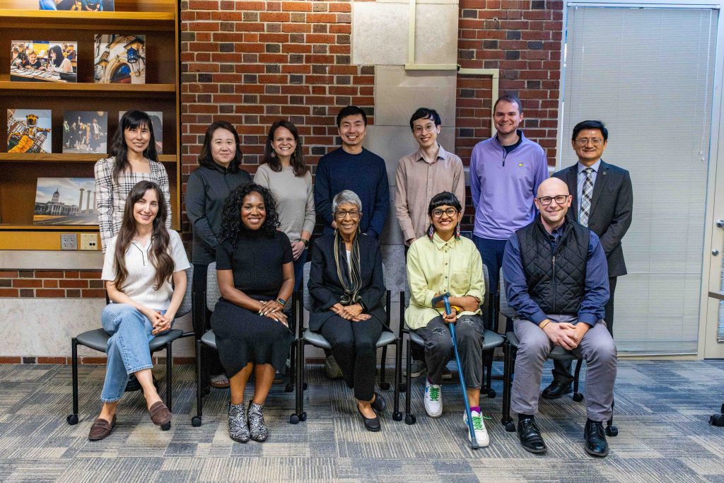 a group photo of Sandra Gautt, Dean Kui Xie, and early career mentees