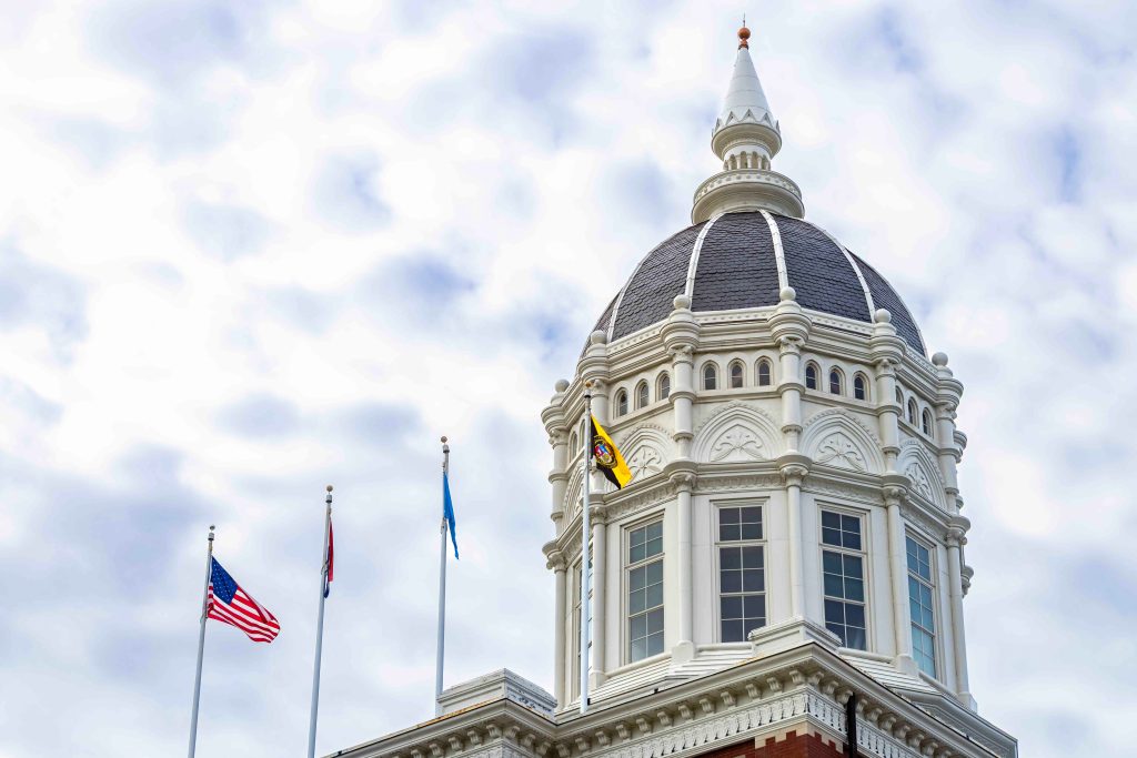 Campus beauty, Jesse Hall with flags on the roof