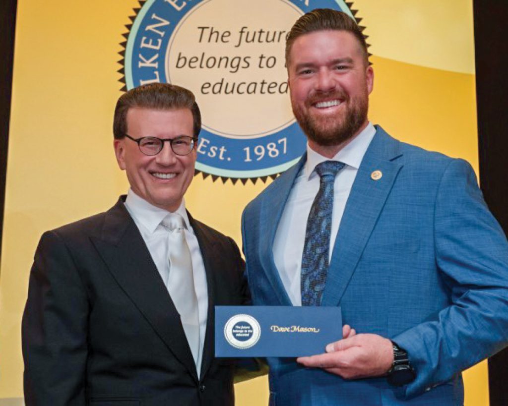 David Mason receives his award at the official ceremony