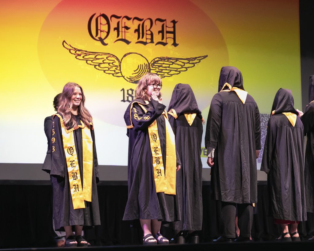 Jaimes Donovan with QEBH on stage on Tap Day