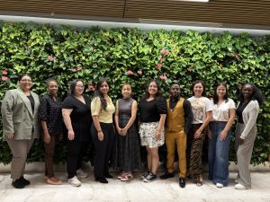 Aida (third from the right) poses with other scholars from the Society for Research in Child Development program