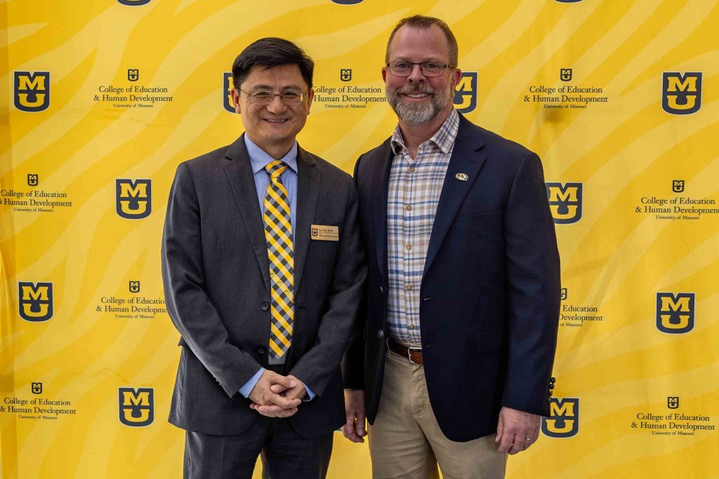 Dean Kui Xie and Andrew Lootens-White pose for a photo