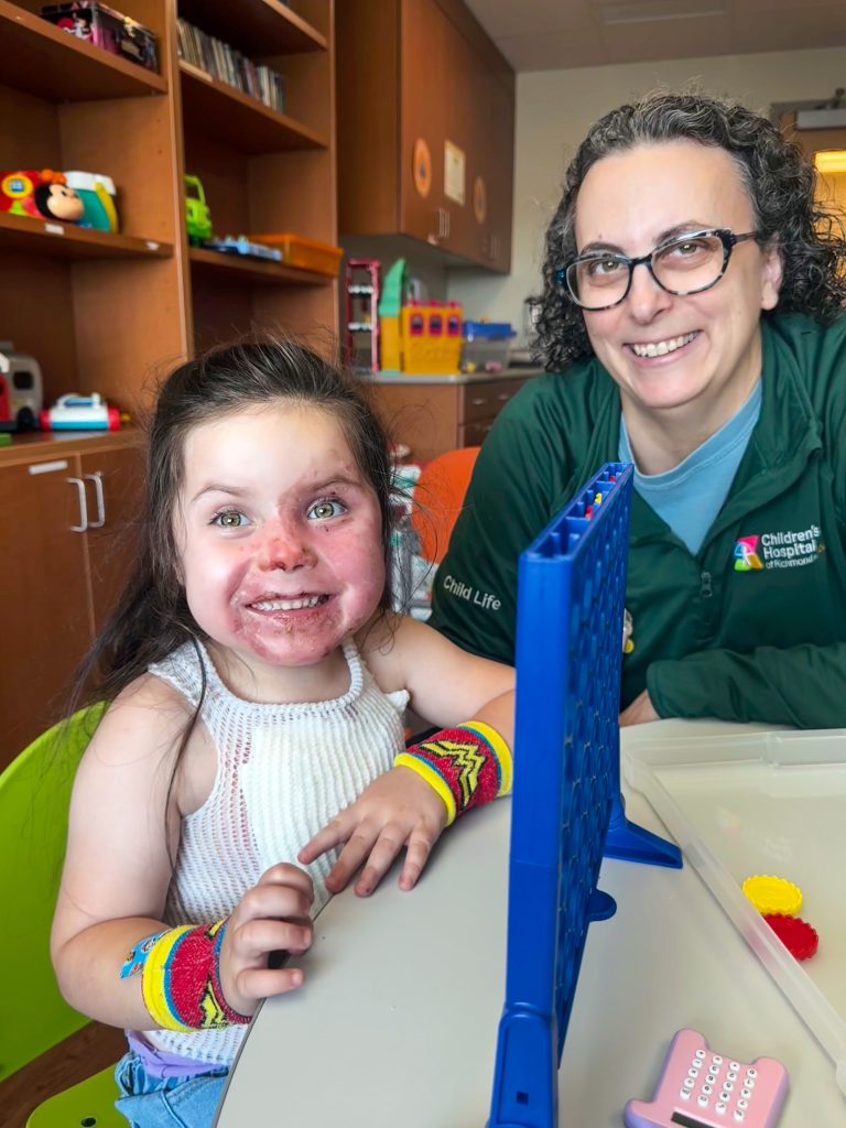 Heather Rossi with a patient