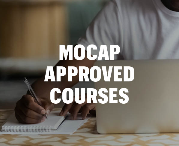 Mizzou Academy MOCAP Approved Courses, photo of African American man holding pen and writing in notebook with laptop open