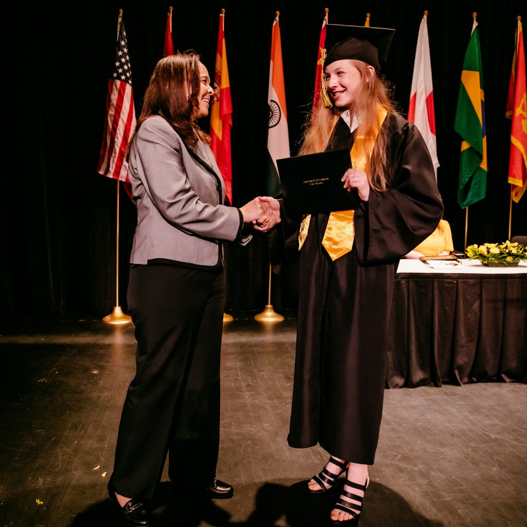 Mizzou Academy student receiving their diploma.