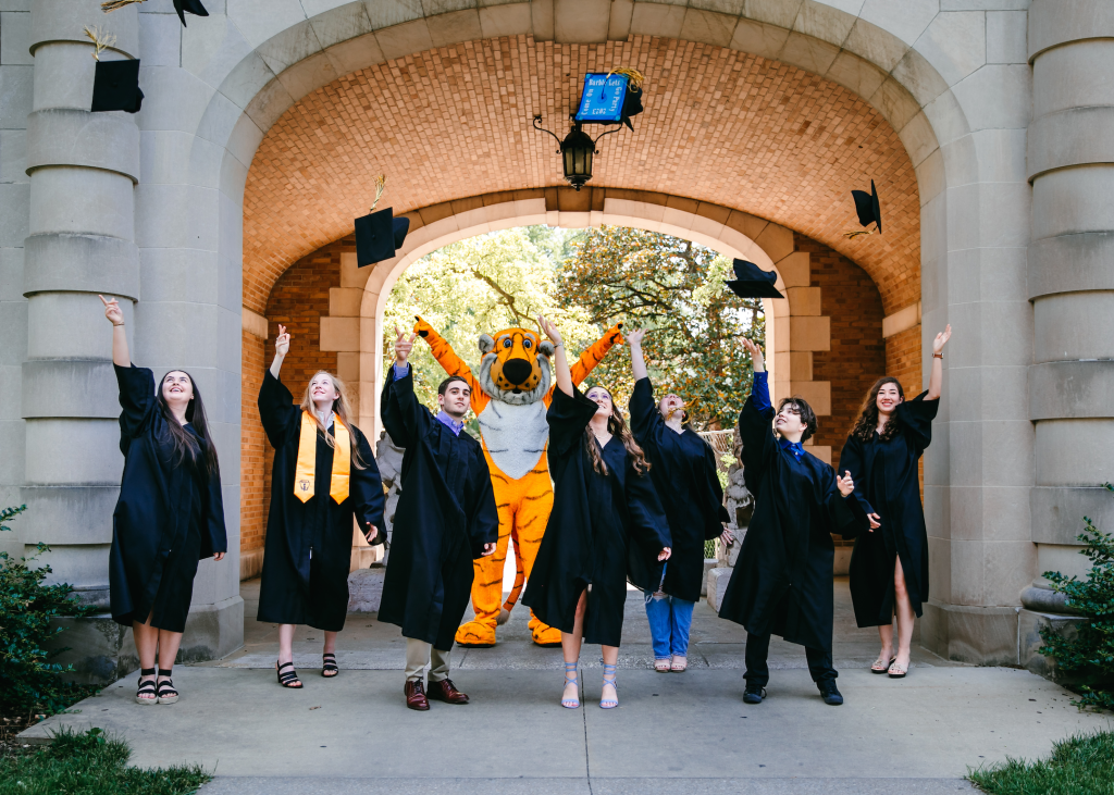 Graduating Students celebrate with Truman Tiger.