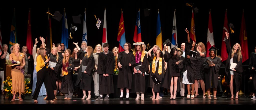 Students celebrating graduation.
