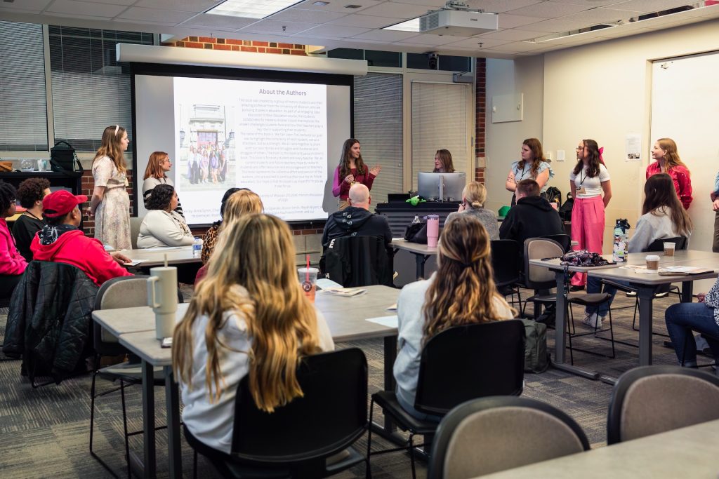 Teachers presenting materials.